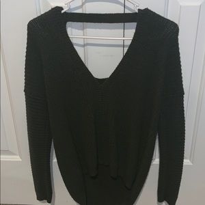 Hunter green sweater.